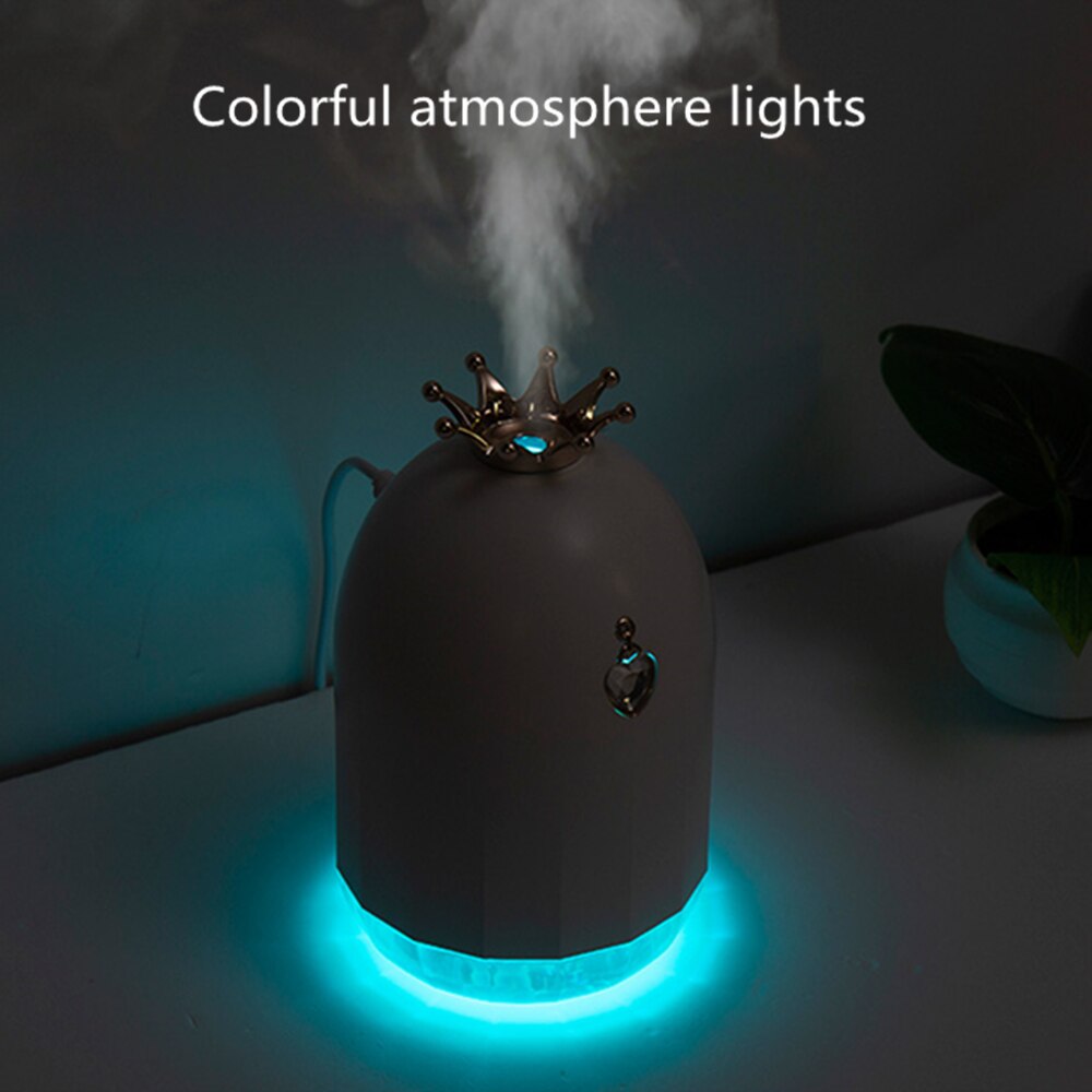 Humidificador de siete colores, pequeño producto nuevo y creativo, suplemento de agua, silenciador de corona, electrodomésticos con pulverizador. 