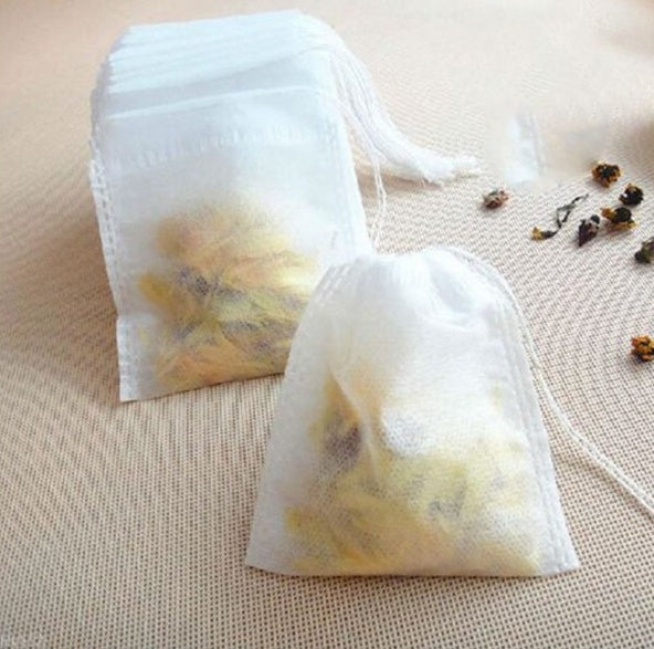 100Pcs Lot NonWoven Fabric Teabags 5.5 X 7CM Empty Tea Bags With String Heal Seal Filter Paper For Herb Tea