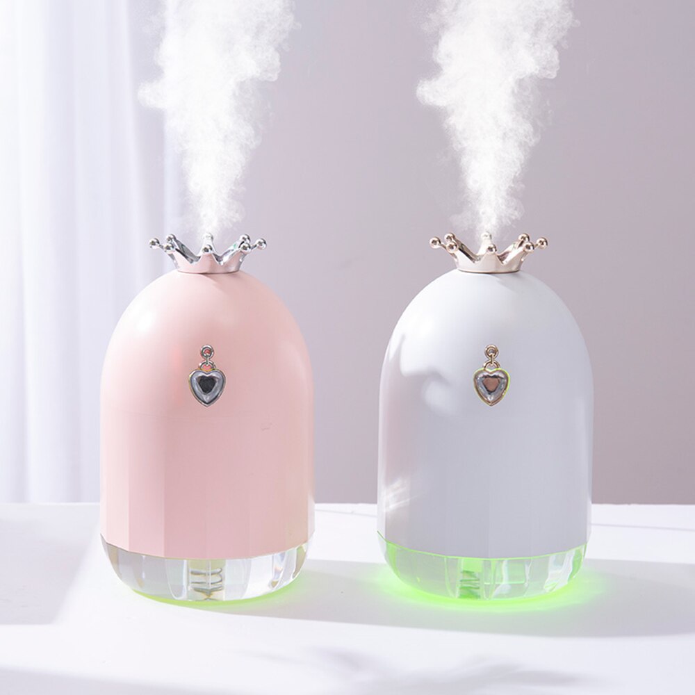 Humidificador de siete colores, pequeño producto nuevo y creativo, suplemento de agua, silenciador de corona, electrodomésticos con pulverizador. 