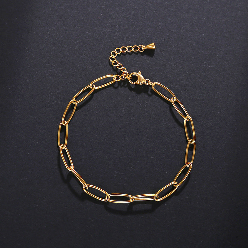 Pulsera de acero inoxidable con cadena ovalada y oro