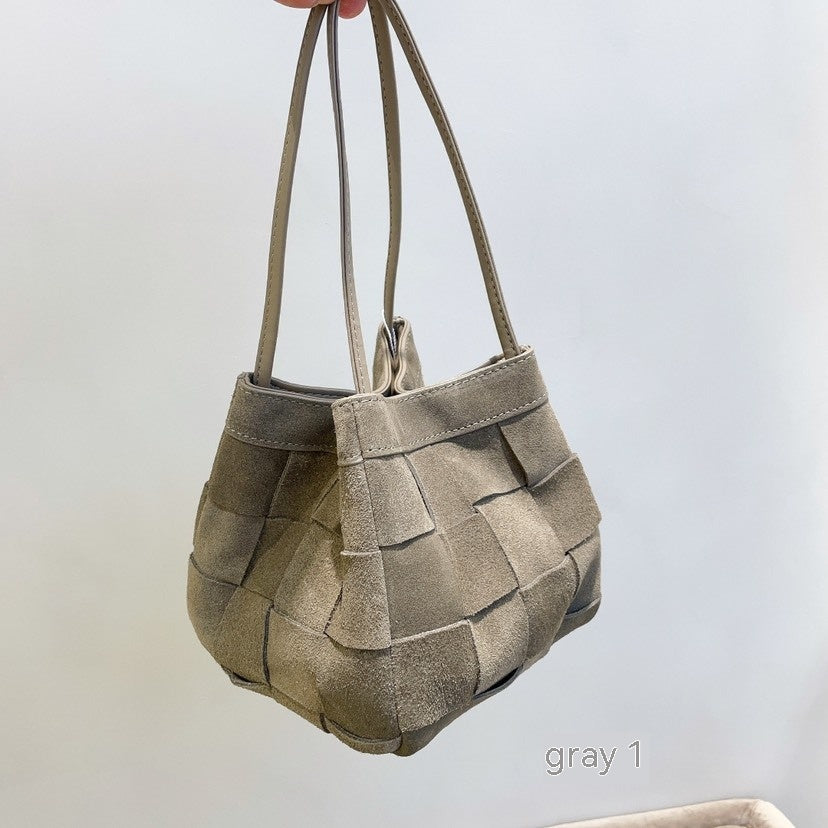 Bolso de hombro portátil de tejido vintage de piel de vaca de otoño e invierno para mujer